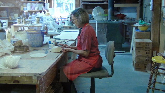 Peek through the window into the studio and see the art being made.