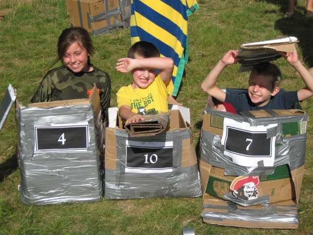 Cardboard boats ready to float