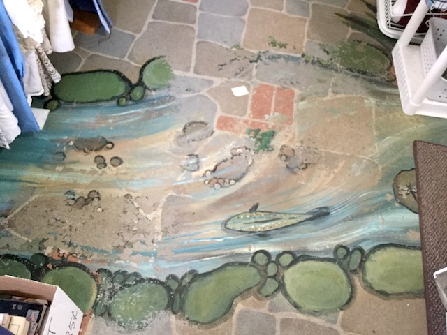 This charming floor mural in one room should captivate the children.