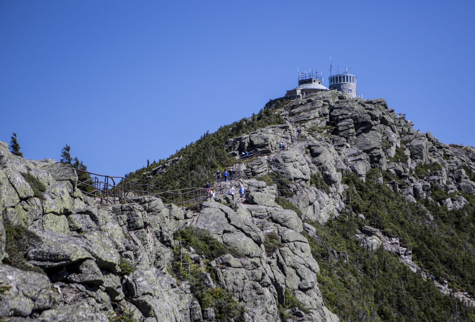 You're almost there! After parking, visitors ascend the stone stairway to Whiteface's open summit.