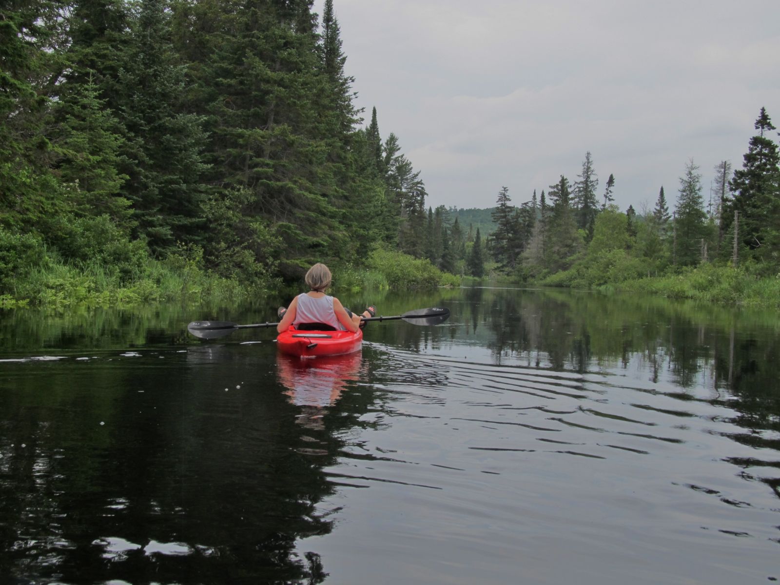 Notice Lisa's feet hanging over the sides. She is relaxed going downstream!