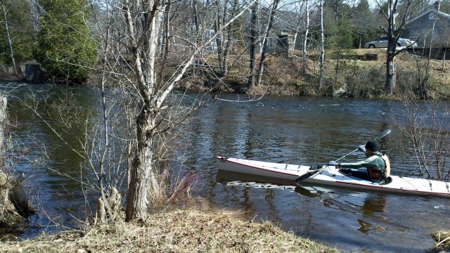 This kayaker is dressed for spring, right up to his warm hat! This kayaker is dressed for spring, right up to his warm hat!