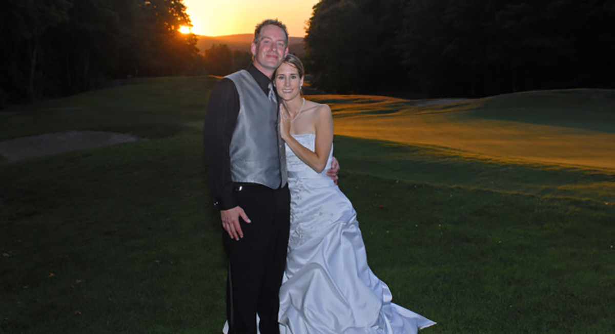My husband and I (August 2007) after hours of eating, dancing and of course saying "I Do!" (Photo complements of Tall Paul Photography)