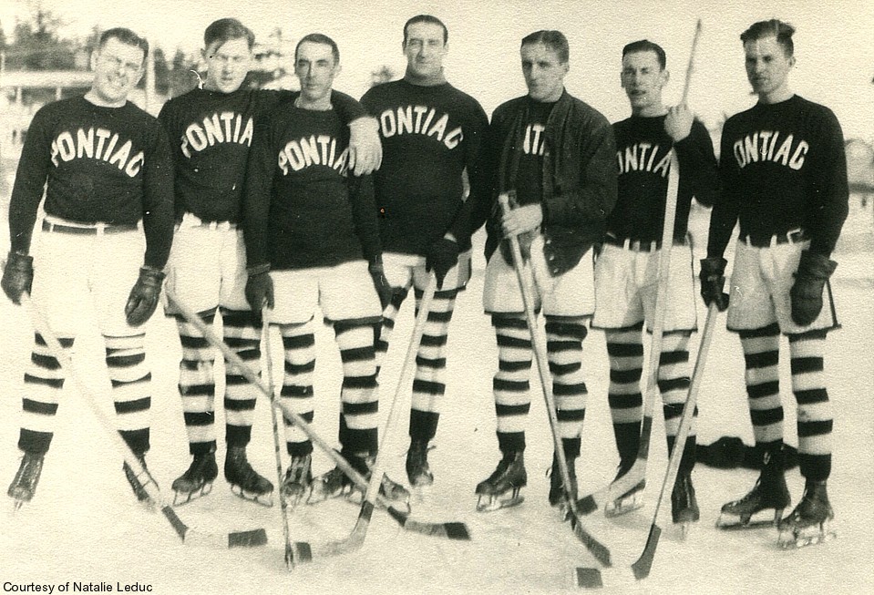 Saranac Lake Boys' Club Pontiac ice hockey team, c. 1924: Lyall Delamater, unknown, unknown, Louis Miron, Bill LaPan, Doug Bombard. Photo courtesy of Saranac Lake Historical Society. Saranac Lake Boys' Club Pontiac ice hockey team, c. 1924: Lyall Delamater, unknown, unknown, Louis Miron, Bill LaPan, Doug Bombard. Photo courtesy of Saranac Lake Historical Society.