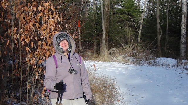 Dress for the trek by keeping sensitive areas covered (I have fake fur hat and hood to cover all eventualities) and my gloved hand holds the vital trekking pole.