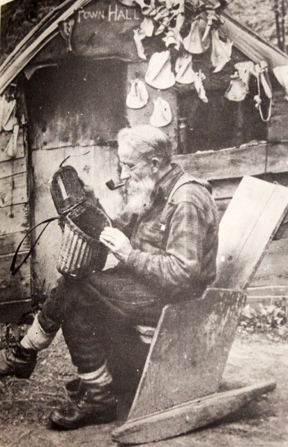 Noah John Rondeau sits outside of the Cold River City town hall.