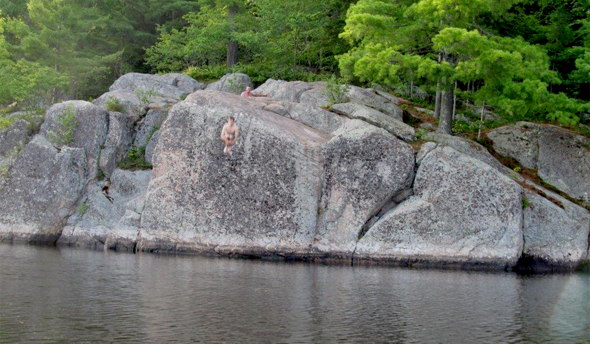 Jumpin' from "The Bluffs" on Big Tupper Lake (Lisa Sciacca photo)