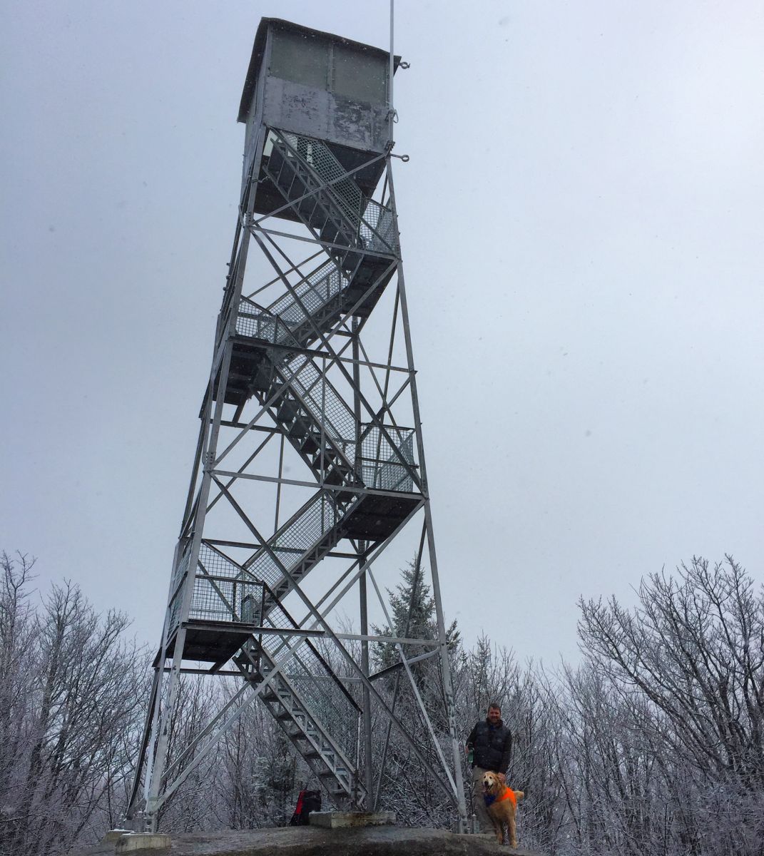 Tim and his four-legged companion, Jack, enjoy a December afternoon at the Mount Arab fire tower. Photo courtesy of Noelle Short