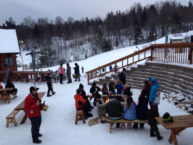 End of the day - warming up by the fire before heading out for night skiing! End of the day - warming up by the fire before heading out for night skiing!