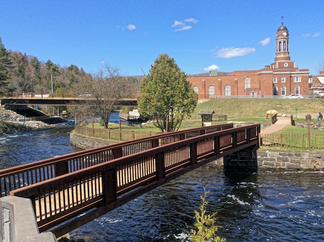 The first bridge of the Riverwalk crosses the Saranac River right below the dam. The first bridge of the Riverwalk crosses the Saranac River right below the dam.