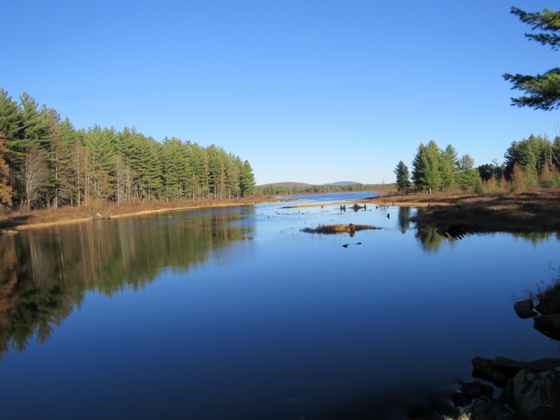 View of the Grass River Flow from the bridge over the outlet