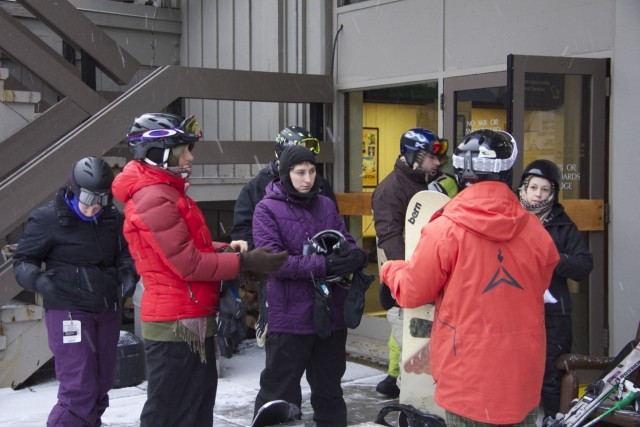Sandy gives instructions before heading to the lift
