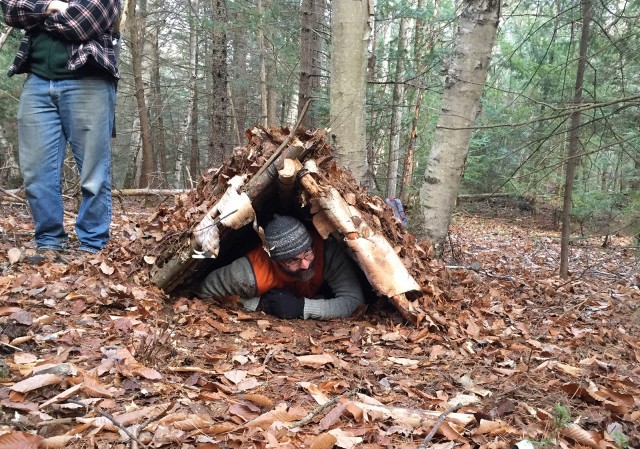 Brian demonstrates getting inside shelter