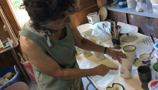Cheri showing new art designs at Jay Craft Studio