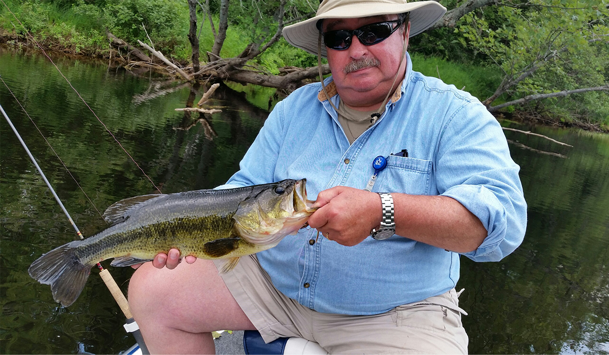 Fishing the calm and tranquil waters of the Raquette River - photo courtesy of John Dixon Guide Services