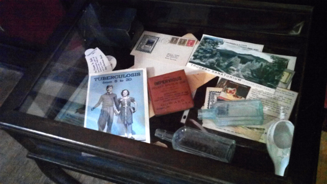 tuberculosis continued to be a public health menace until after WWII Tuberculosis memorabilia in a display case