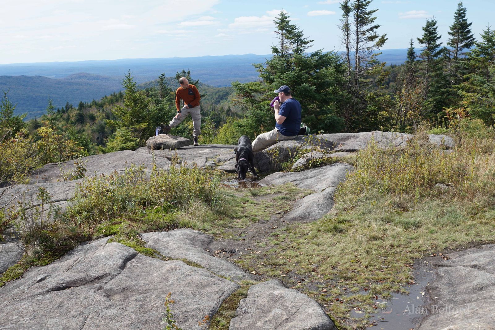 Everyone paused for water and rest at the summit - not to mention the view. Everyone paused for water and rest at the summit - not to mention the view.