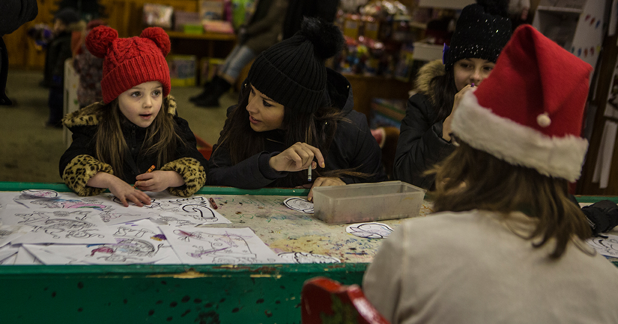 Santa's elves are ready to help the little ones at Santa's Workshop.