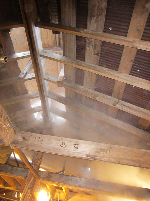 Looking up at steam esacaping through the roof vent in the shack.