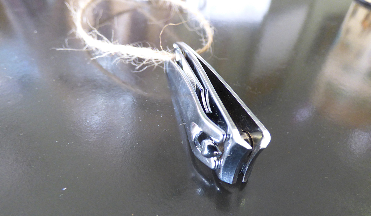 Keep a set a nail clippers around your neck