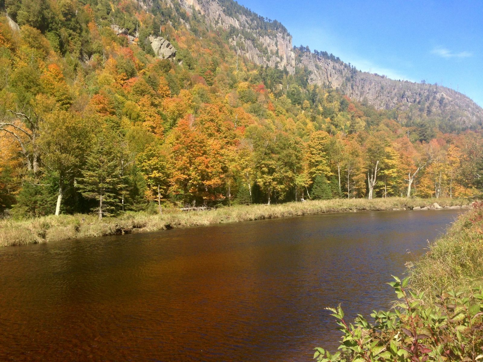 The combination of the towering cliffs and the rapid river creates multiple composition possibilities.