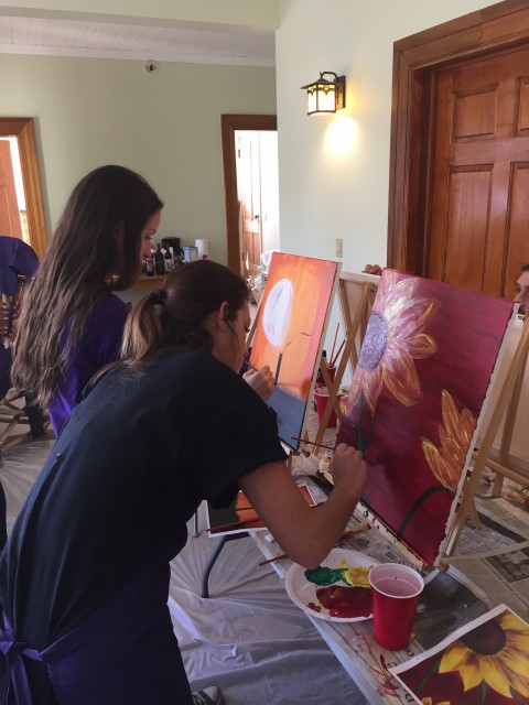 Working hard on their paintings!