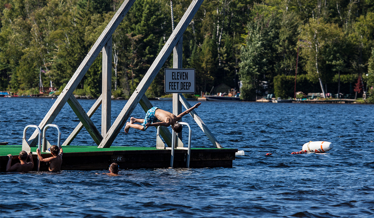Diving off the "Big Dock" at Little Wolf Beach