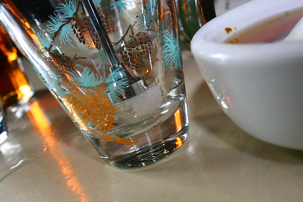 Muddle a sugar cube.