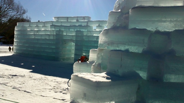 partially built Ice Palace rising from the lakeshore partially built Ice Palace rising from the lakeshore