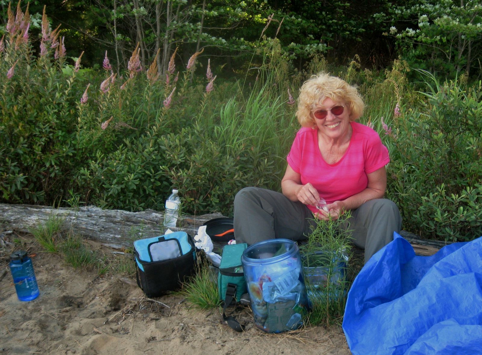 Peggy organizes the bear canisters!