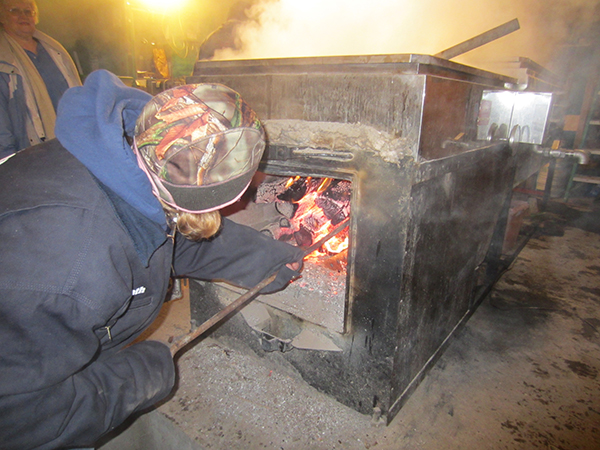 MaryBeth stokes th firebox.