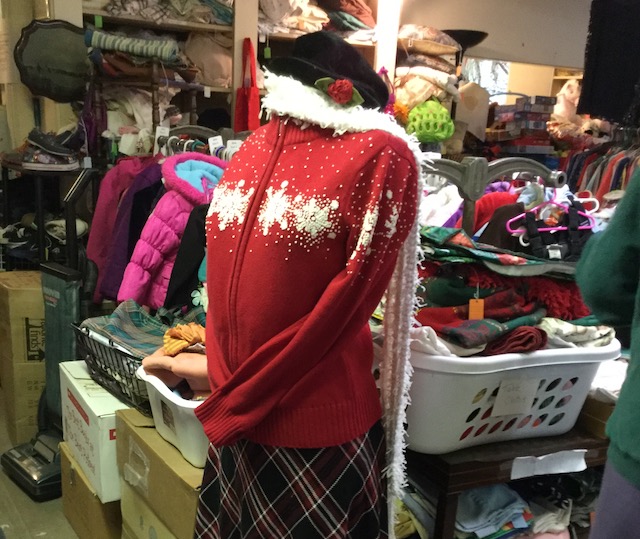 The care taken with the donated and consignment goods shows in this display by a volunteer.