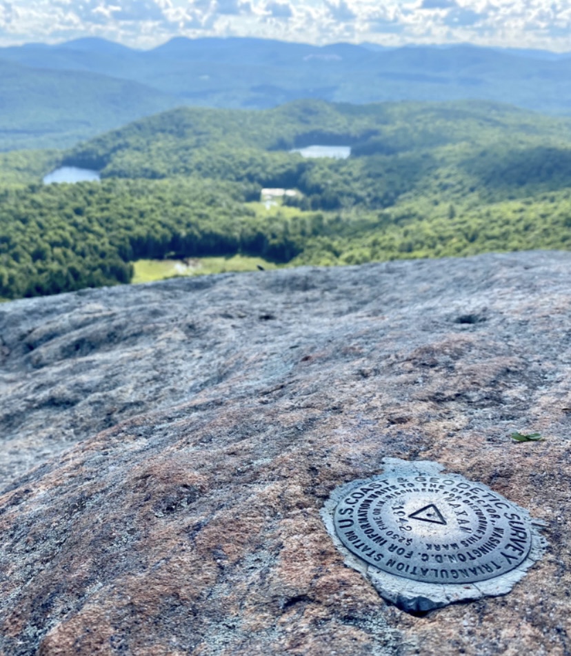 survey marker at summit with misspelled name; "Maxam" instead of Moxham