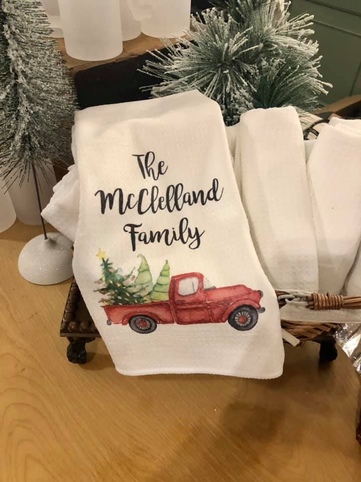 Spruce and Hemlock hand towel with a red truck on it. 