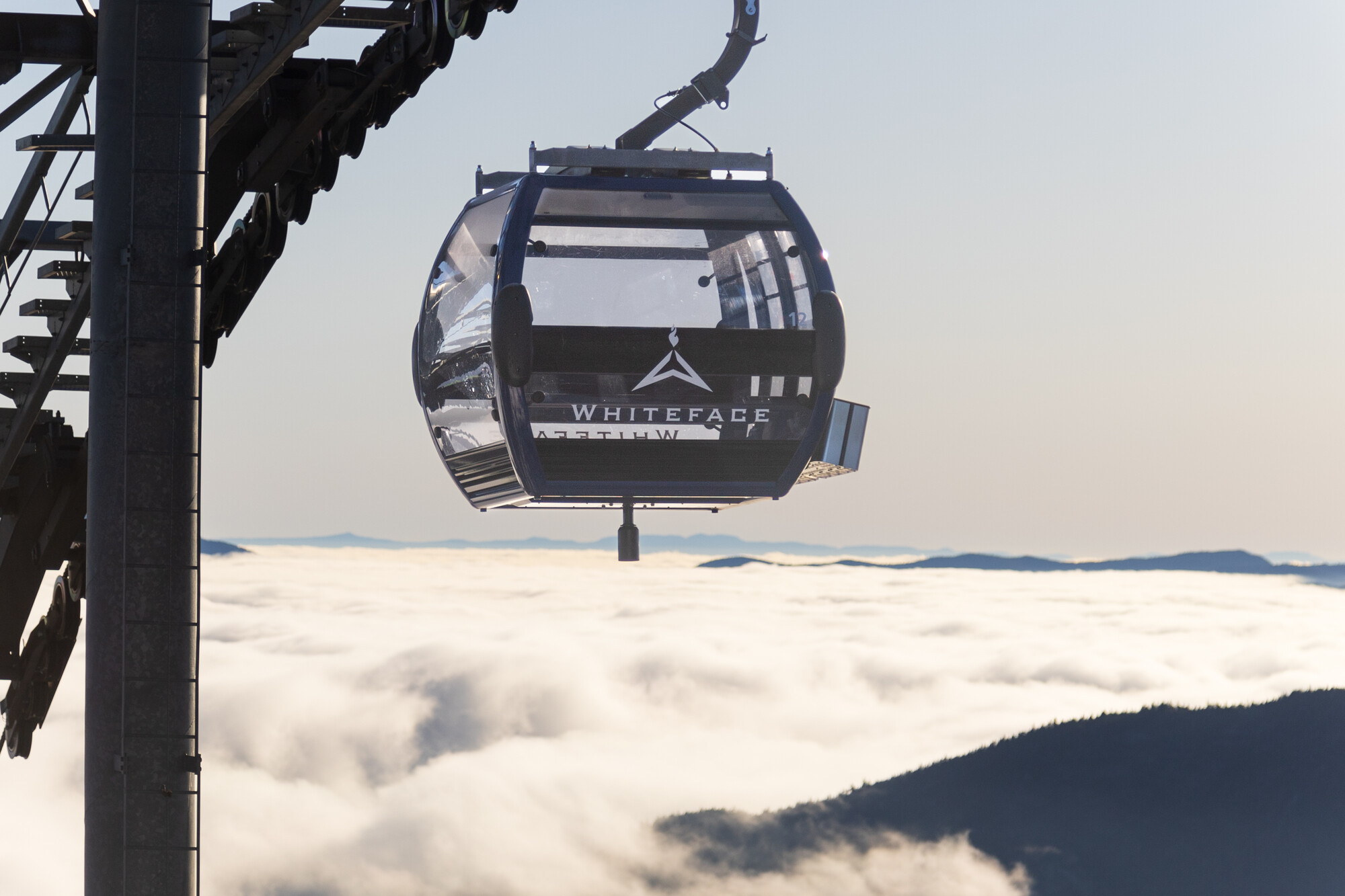 The Whiteface Cloudsplitter Gondola ascending above the clouds.