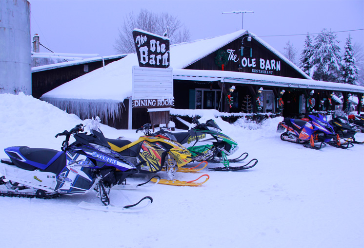A rustic barn-style restaurant in winter. 