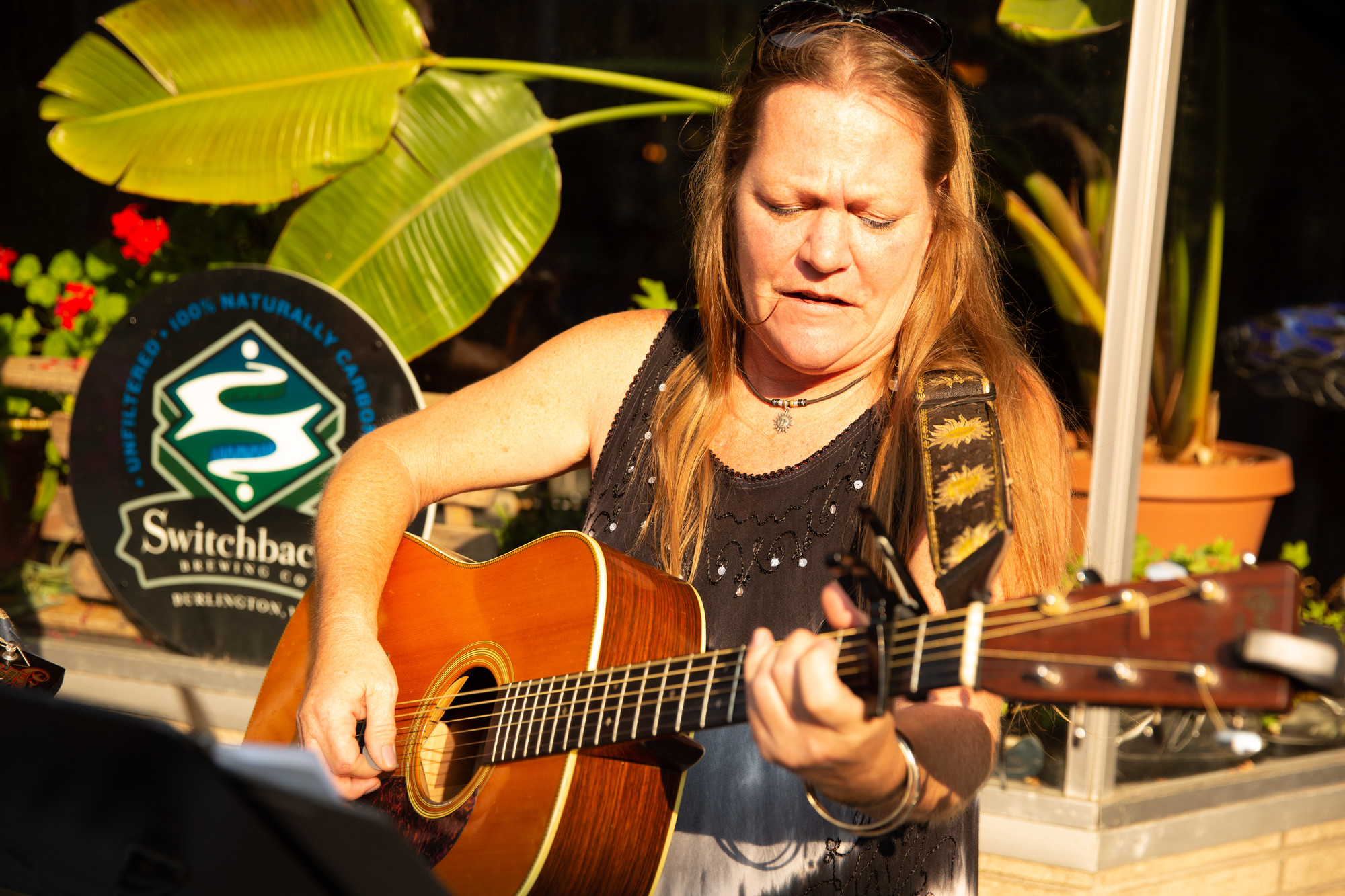 A musician performs during the self-guided Saranac Lake art tours