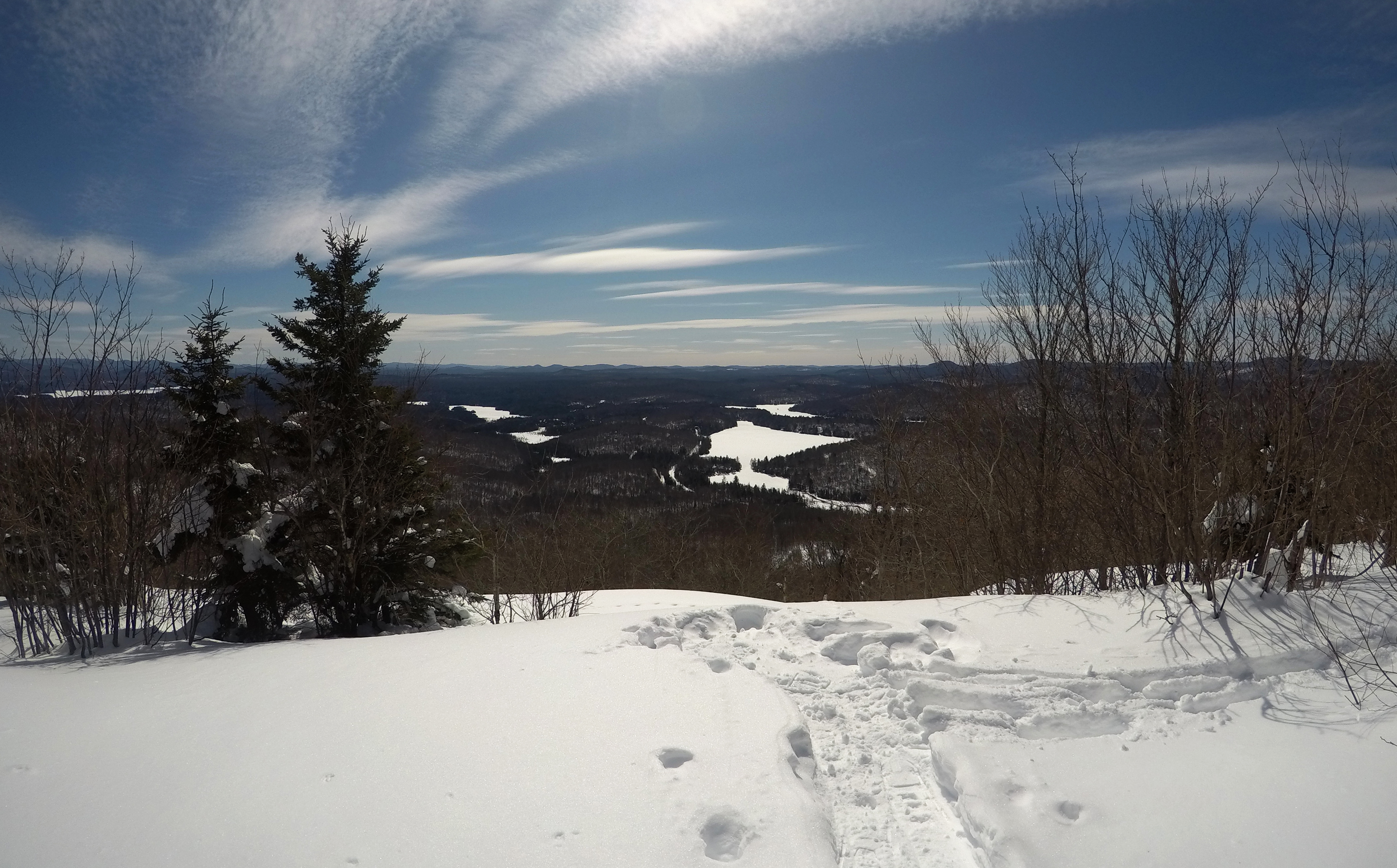 The view from the summit of Mt. Arab. Lakes and rolling hills fill the distant landscape.