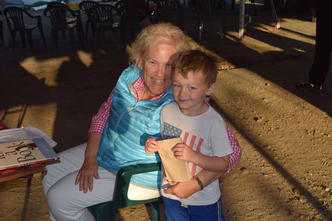 Lorrie Hosley and her grandson at the 2017 Adirondack Author's Night