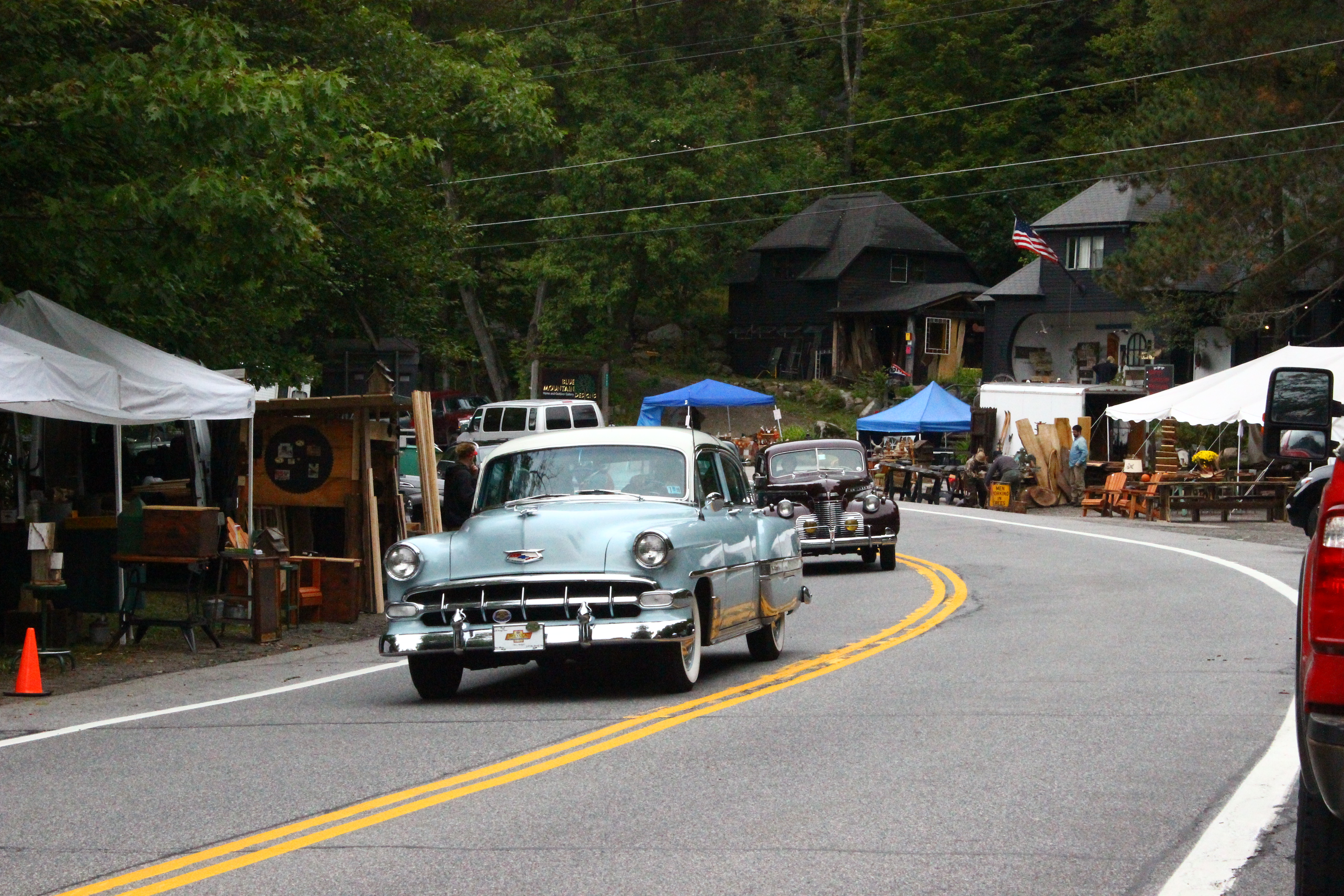 Antique and classic Chevys appeared from around the corner