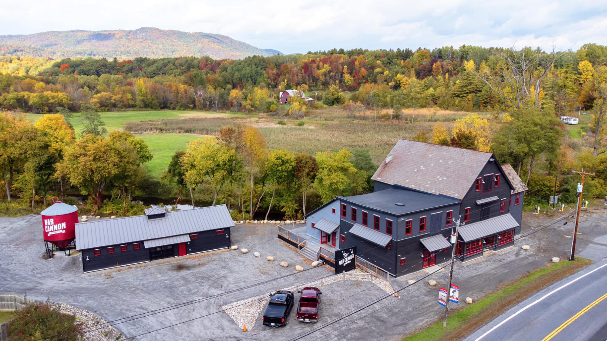 A brewery next to lush fall farmland