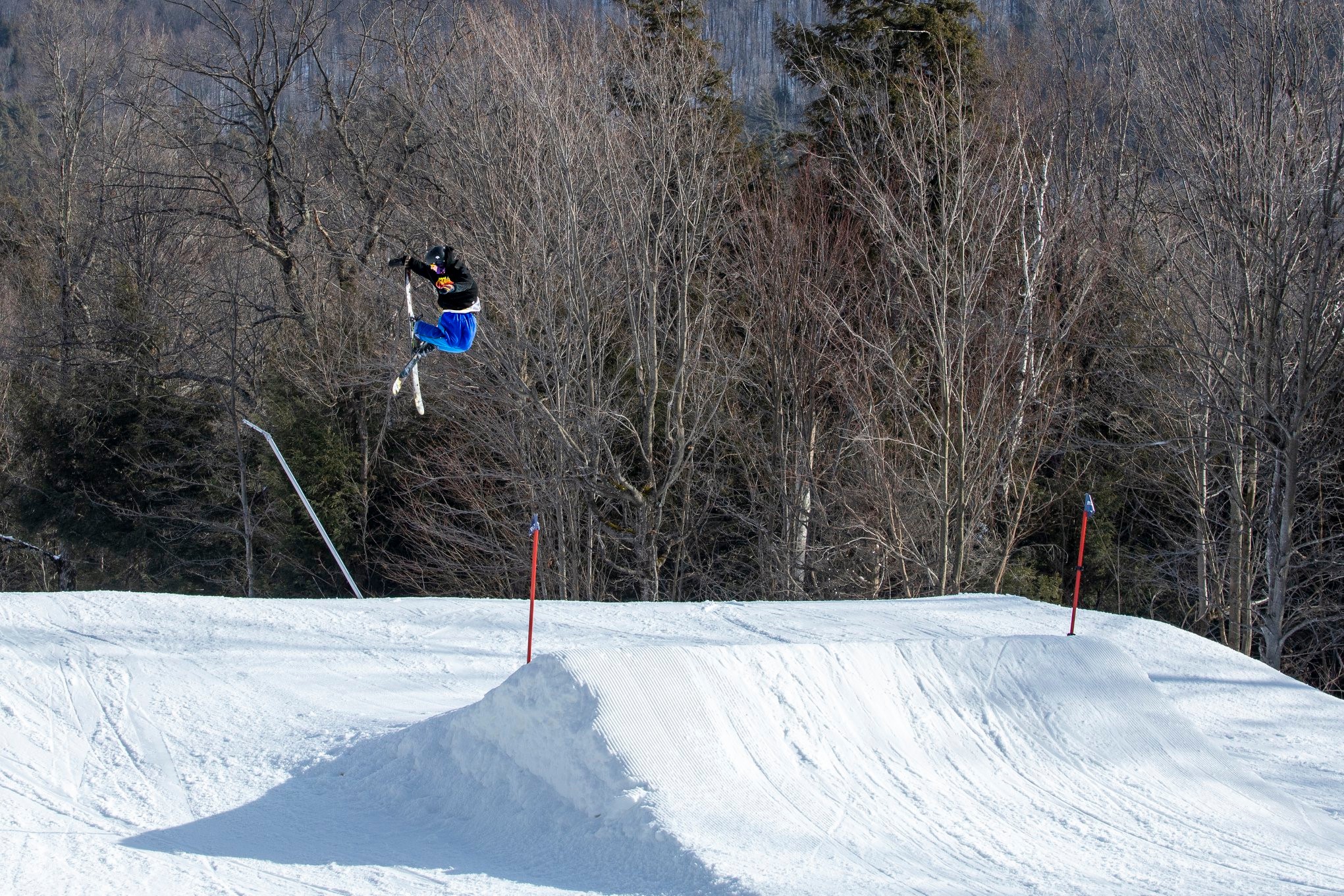 A skier soars above a roller at Whiteface.