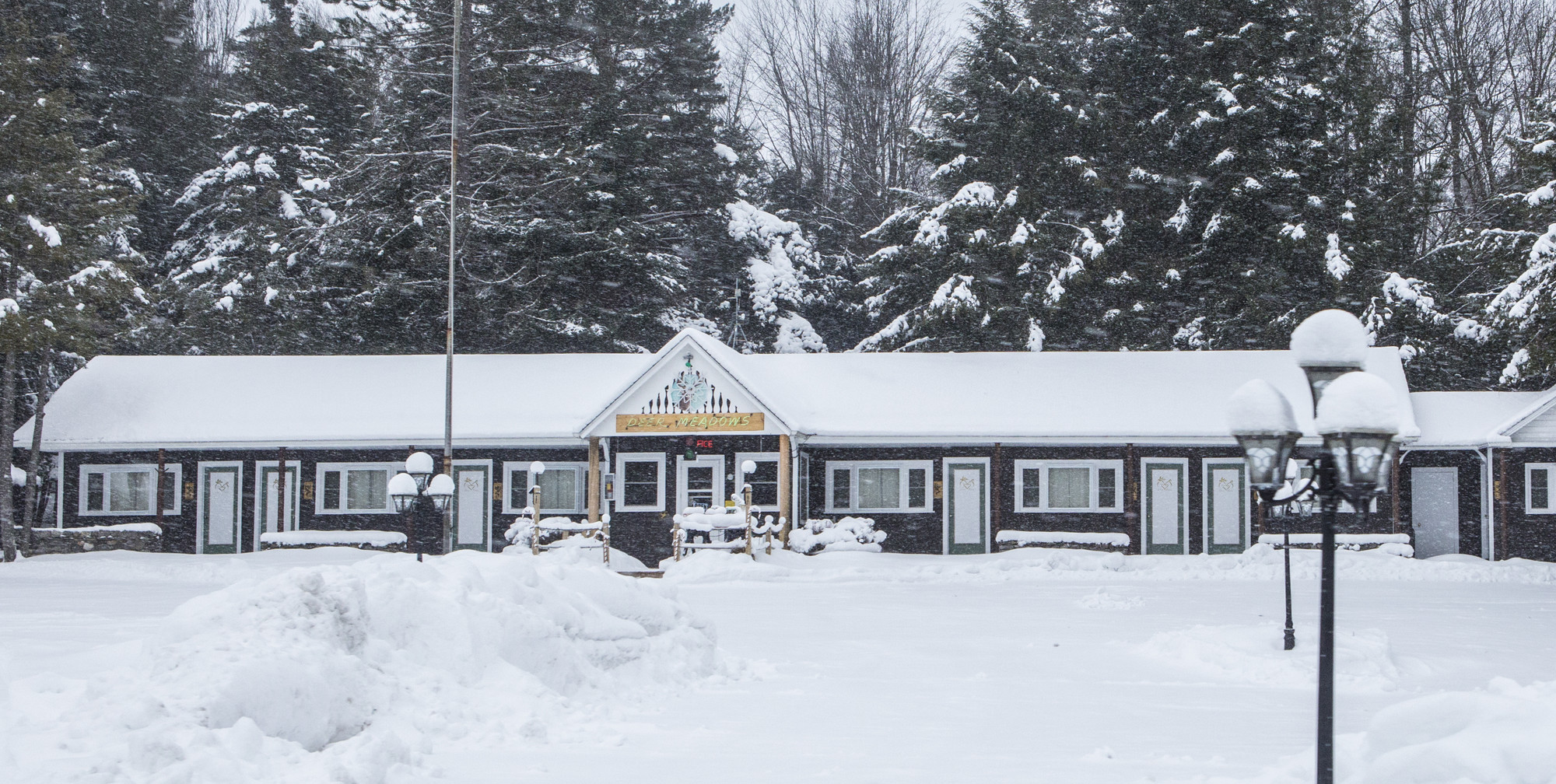 A motel draped in snow
