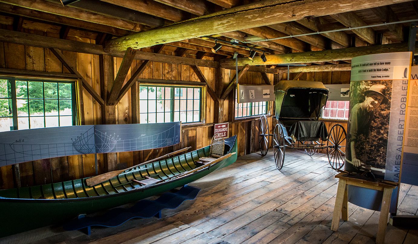 A rustic barn now displays history interpretation panels and displays.