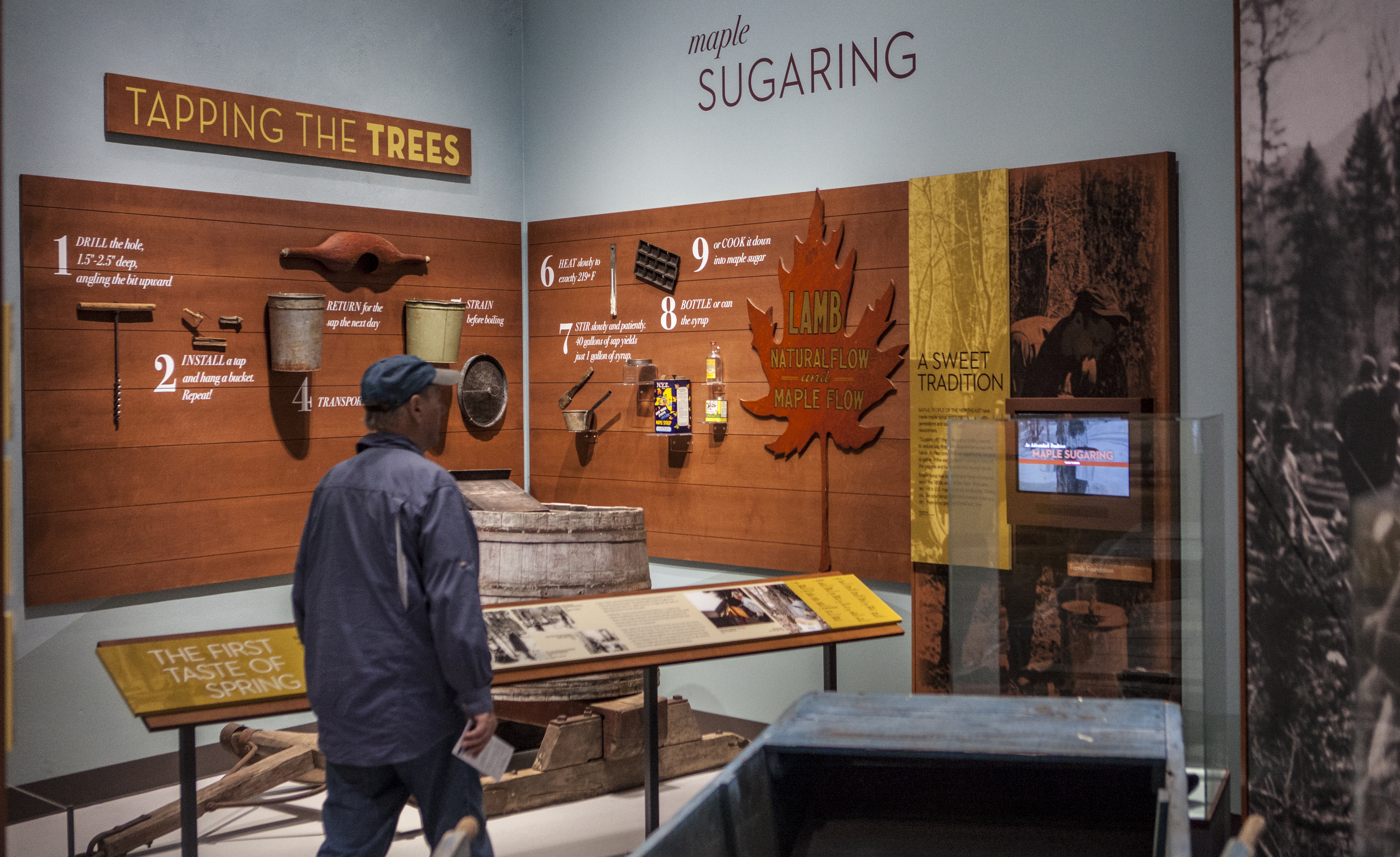Exploring one of the many exhibits at The Adirondack Experience, The Museum on Blue Mountain Lake