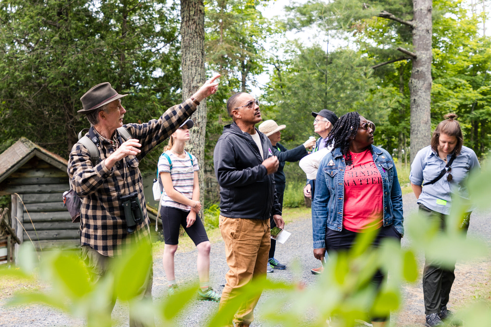 Nature walk with Ed as he guides a group pointing out something of interest.