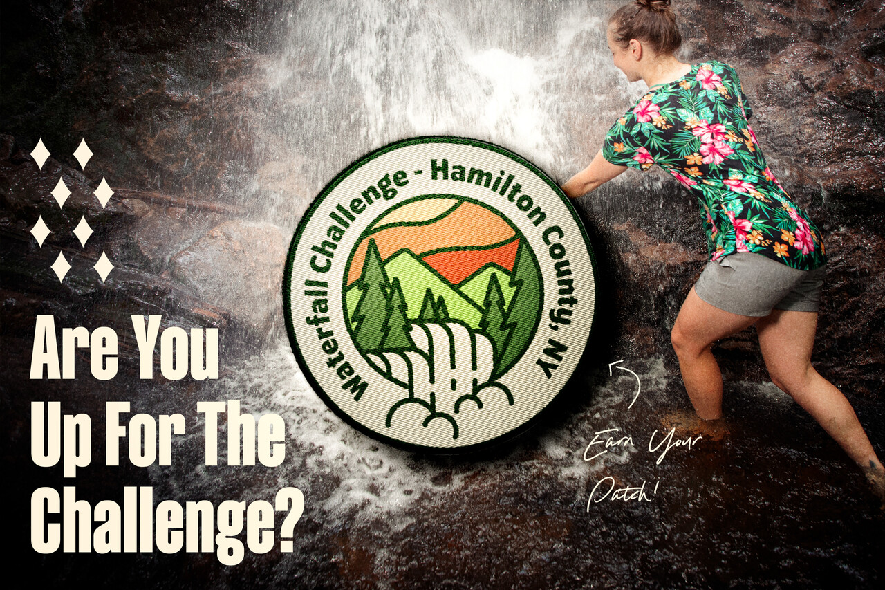 A waterfall challenge patch imposed on a photo of someone enjoying a waterfall