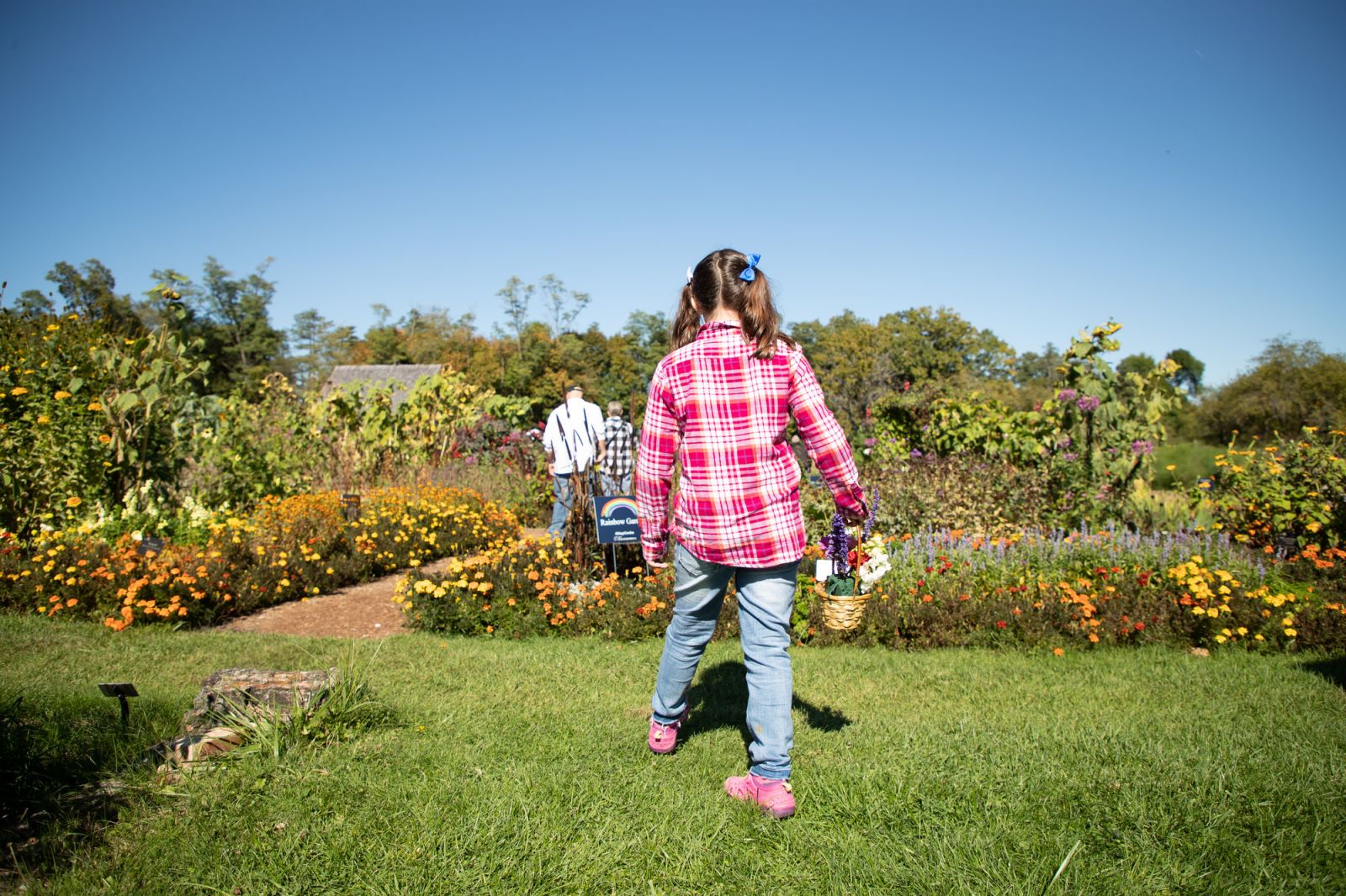 two girls exploring the gardens 