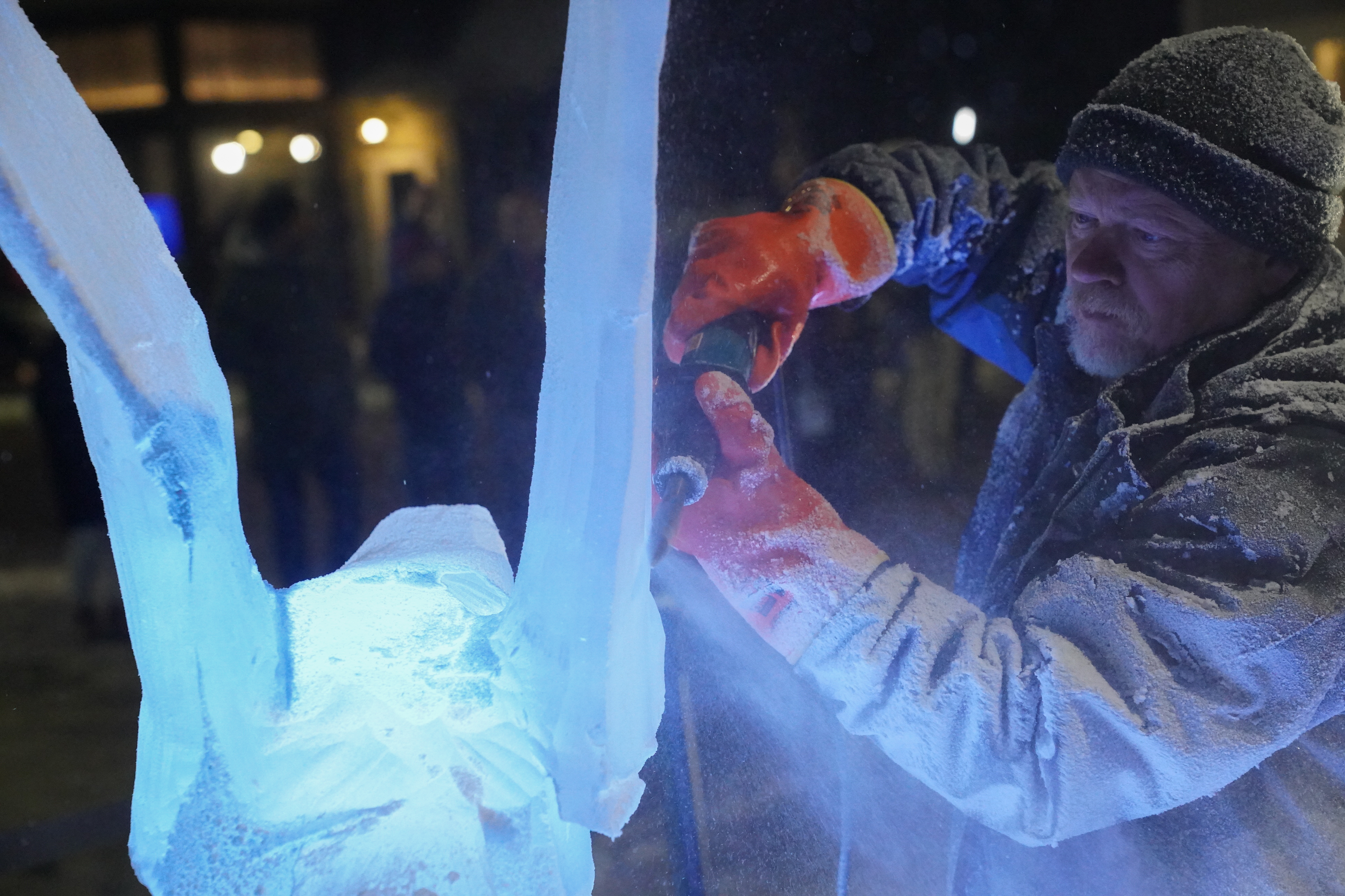 Ice Carvers at the Lake Placid 2023 FISU Game Festival on Main Street in Lake Placid