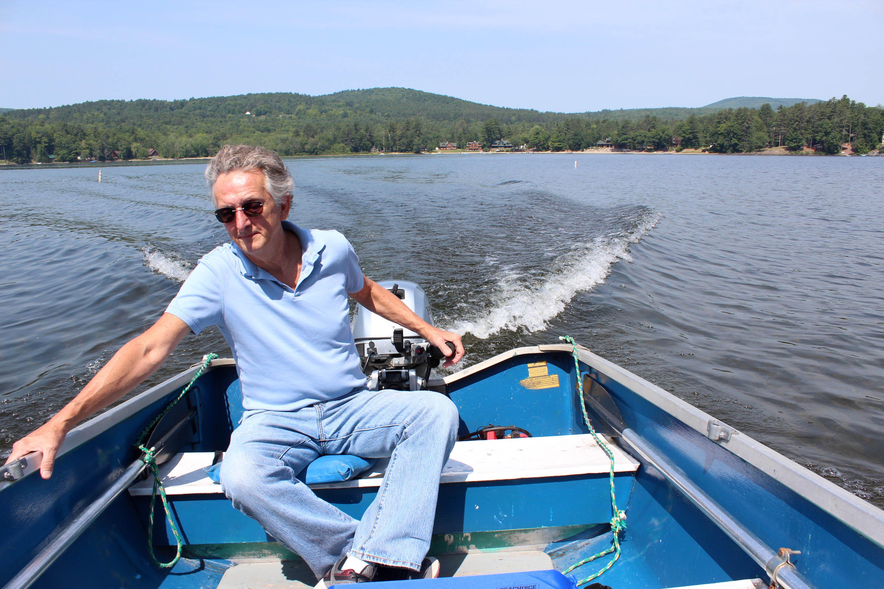 Eric crosses Schroon Lake to get to his workshop. He never complains about the commute.